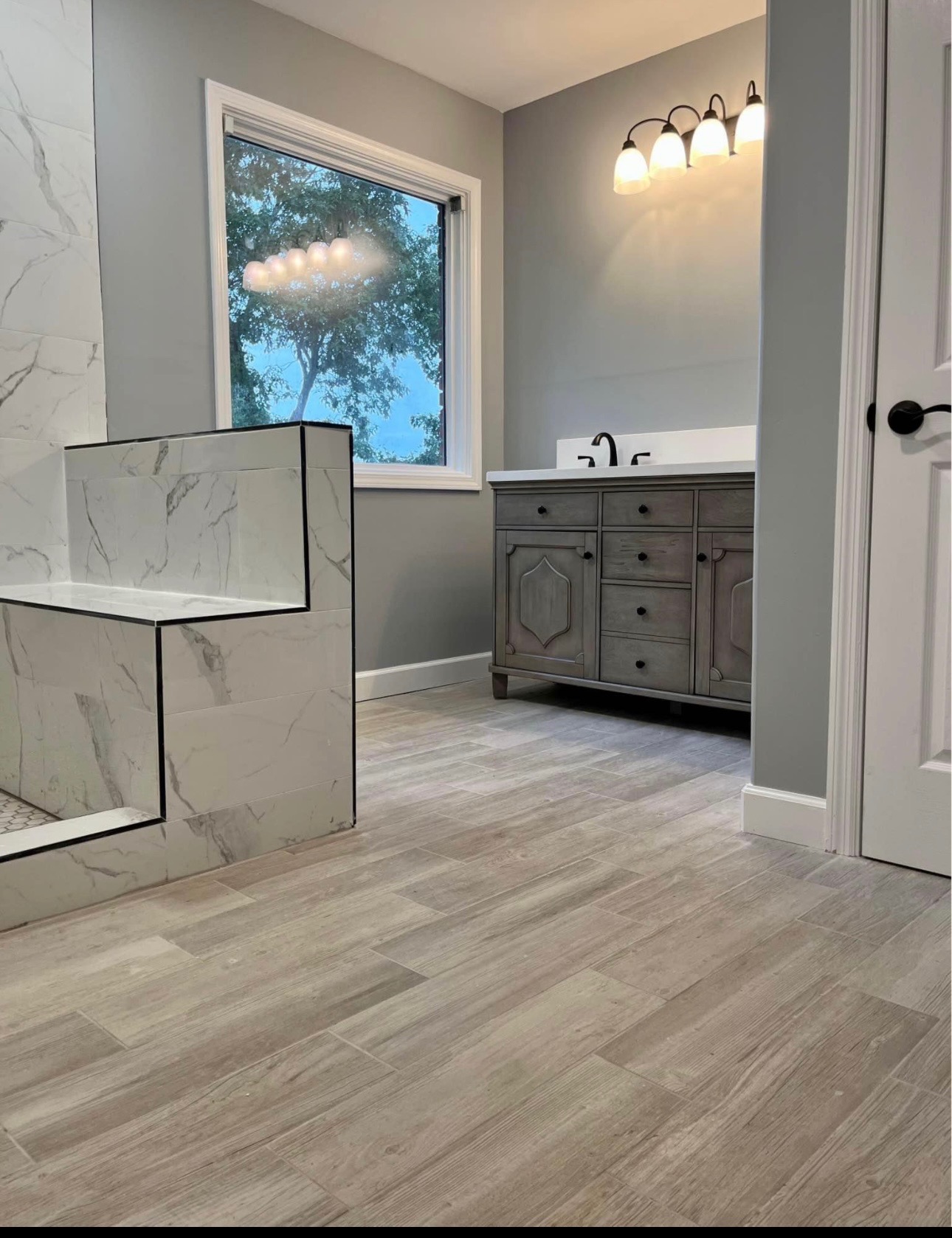 Wood-look tile bath remodel